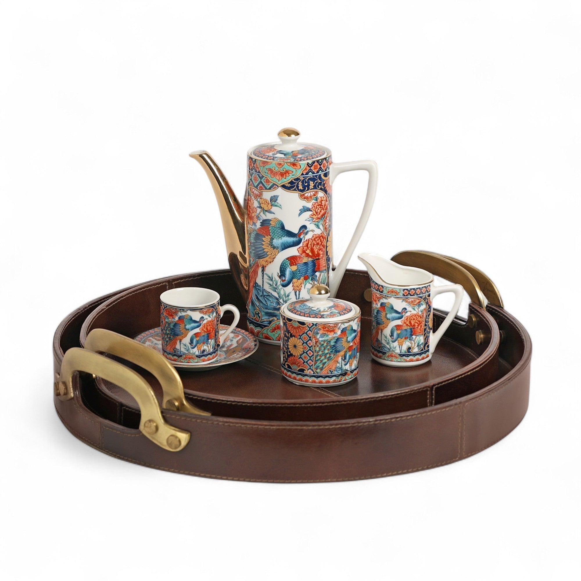 Tea set with floral patterns on a brown tray