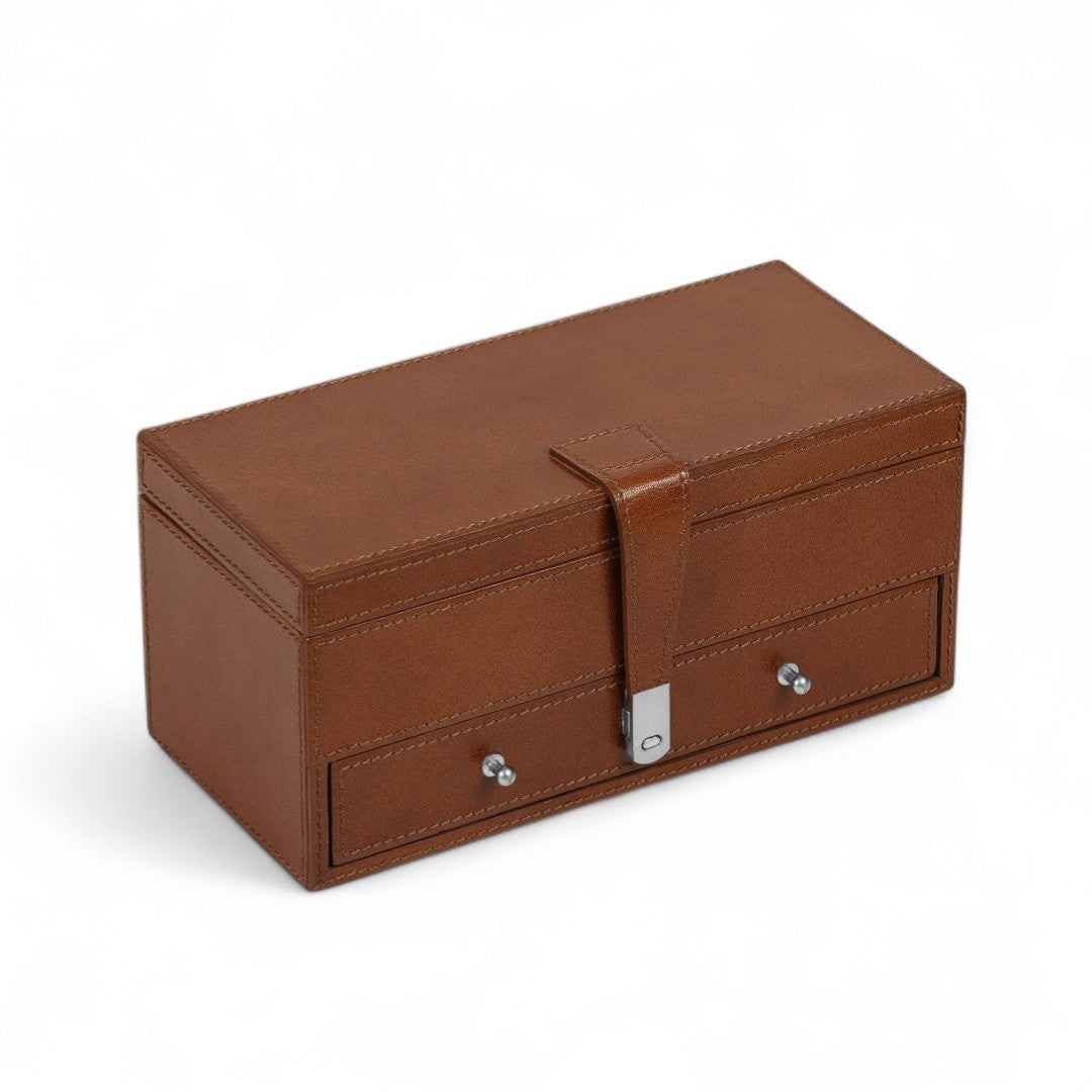 Brown leather jewelry box with a lock on a white background