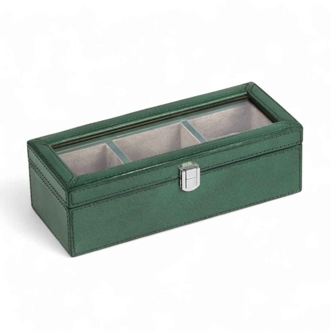 Green jewelry box with glass top on a white background