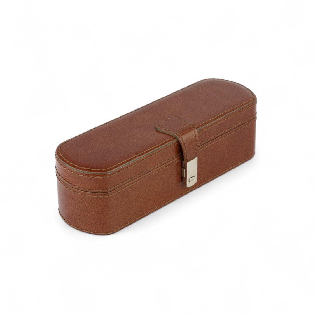 A brown genuine leather oval jewellery box with a secure closure and a built-in mirror.
