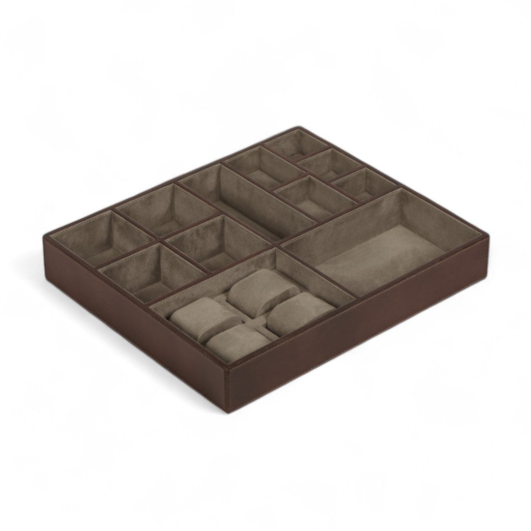 Brown jewelry organizer with multiple compartments on a white background