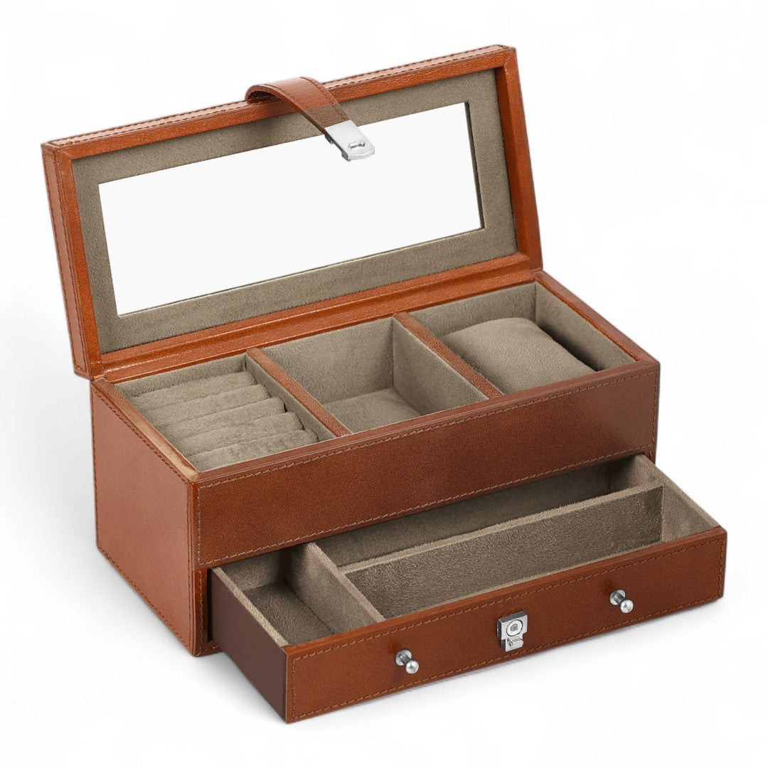 Brown jewelry box with glass top on a white background