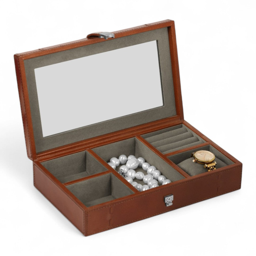Brown jewelry box with compartments for jewelry on a white background