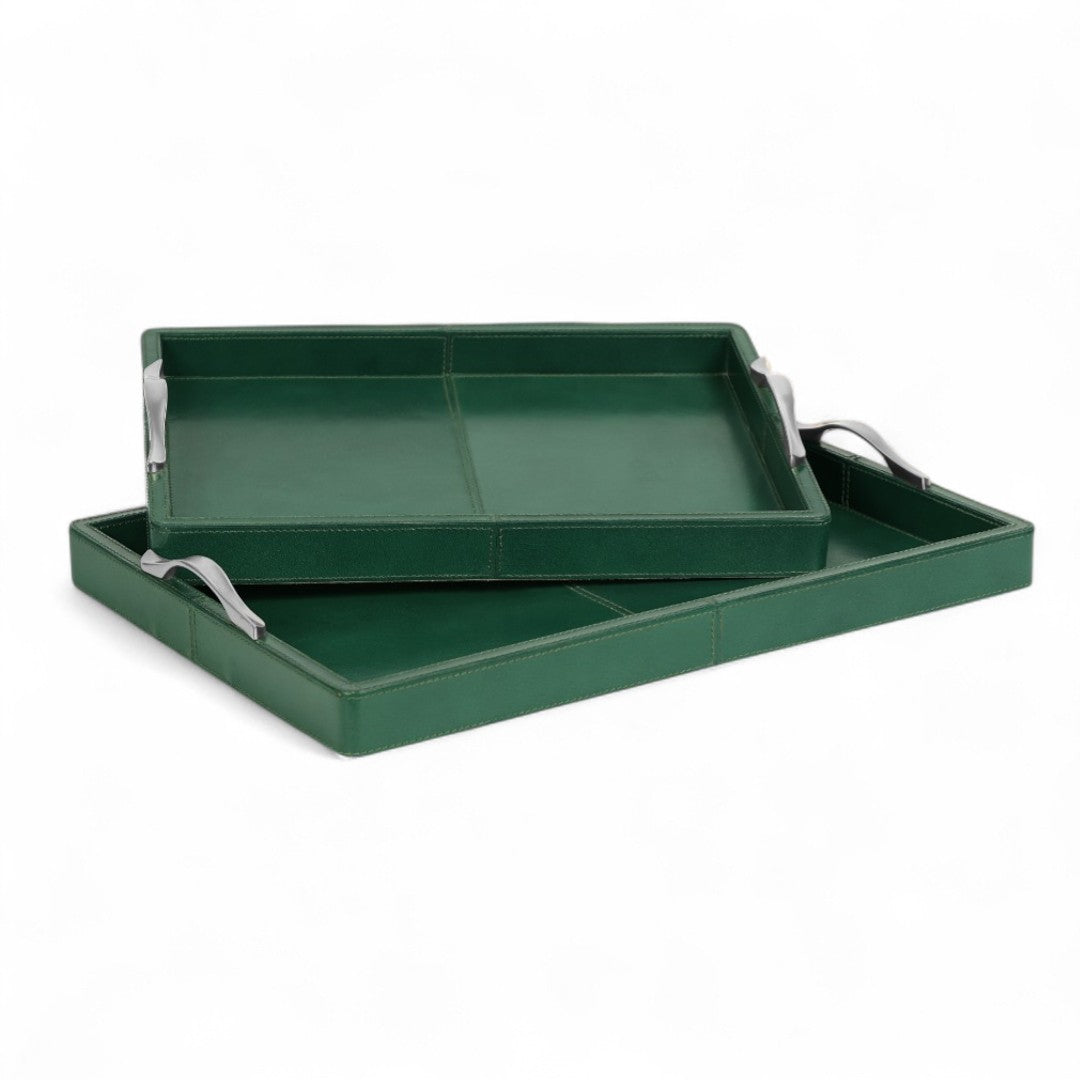 Two green trays with silver handles on a white background