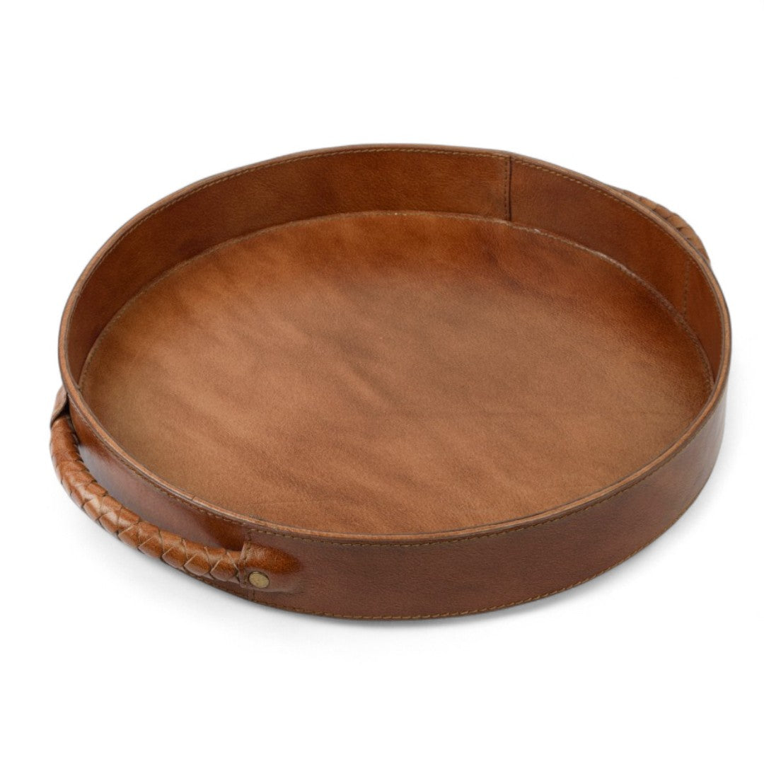 Round brown leather tray with handles on a white background