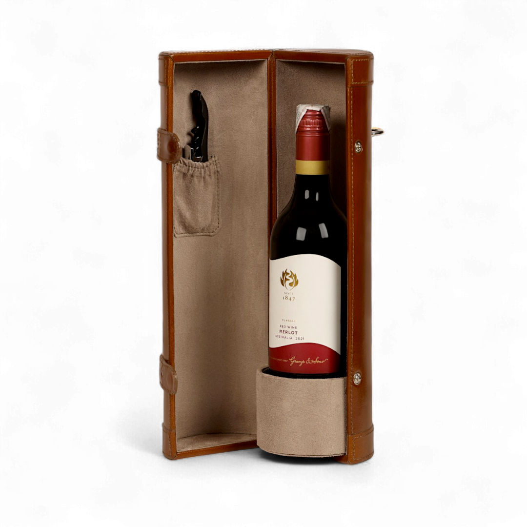 Red wine bottle with a corkscrew in a wooden case on a white background