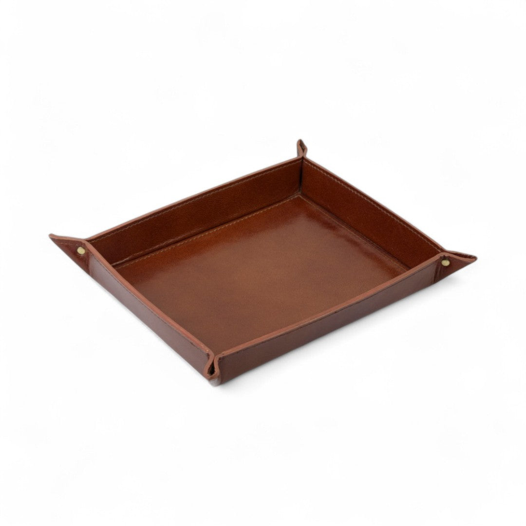 Brown leather tray on a white background