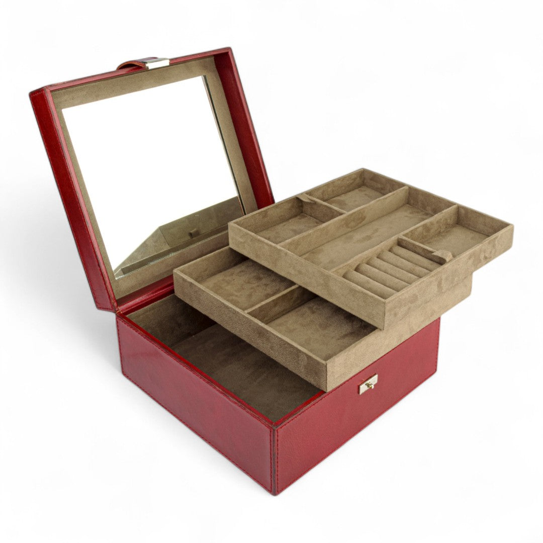 Red jewelry box with beige interior compartments on a white background
