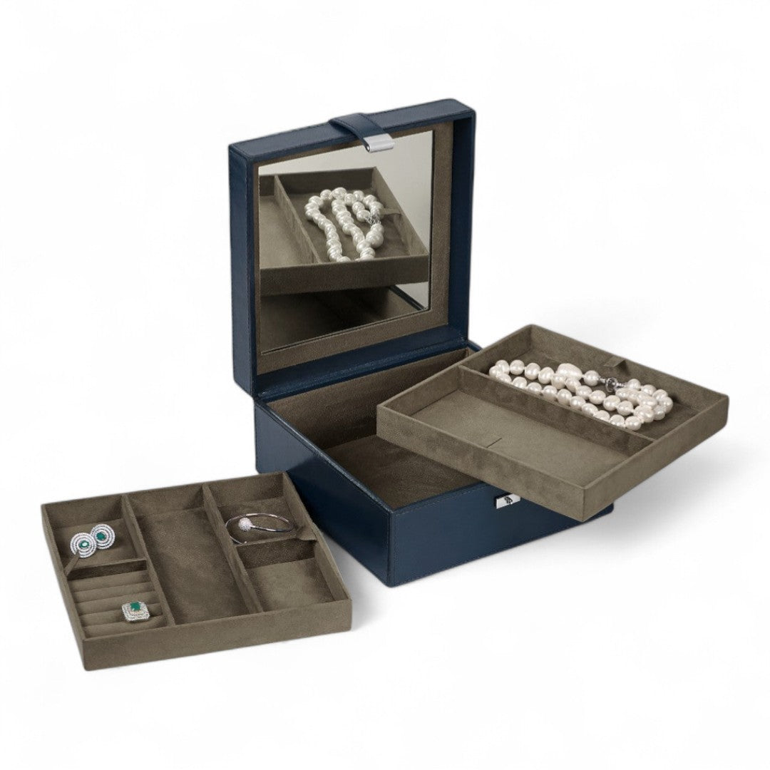 Jewelry box with compartments for jewelry on a white background