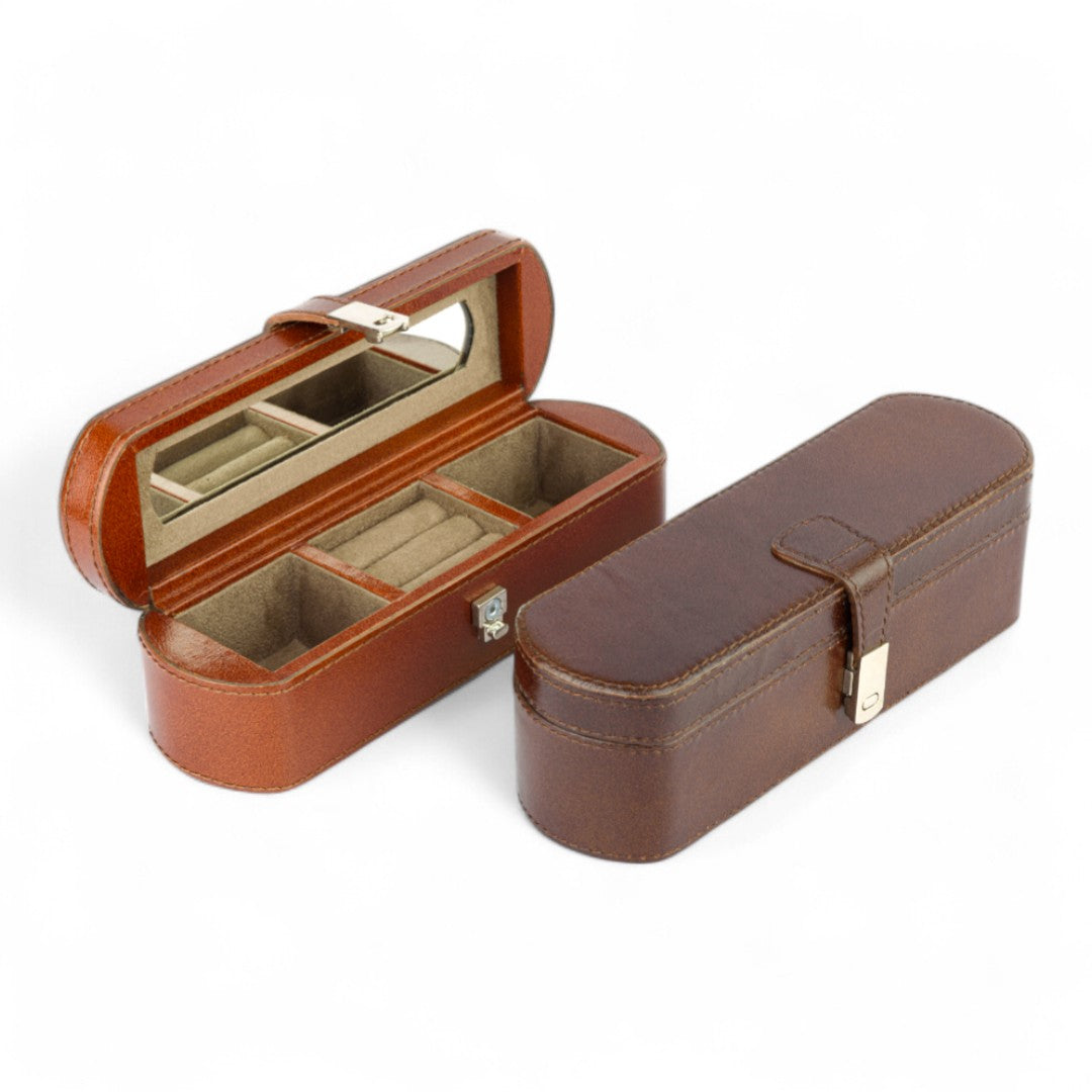 Brown jewelry case with open lid showing compartments on a white background