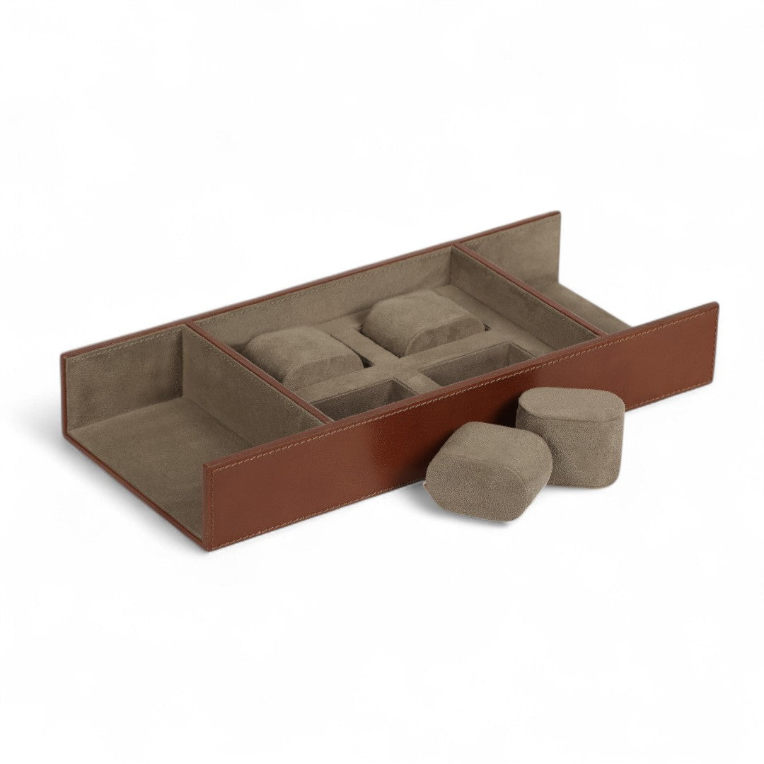 Brown jewelry box with compartments on a white background