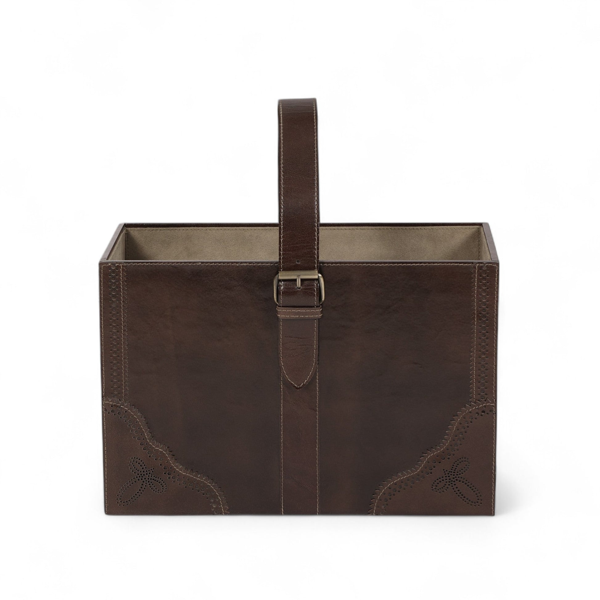 Brown leather basket with handle and decorative stitching on a white background