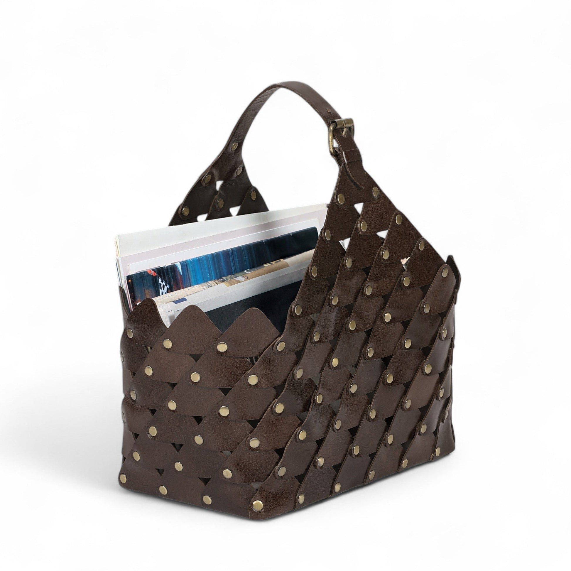 Brown woven handbag with gold studs on a white background