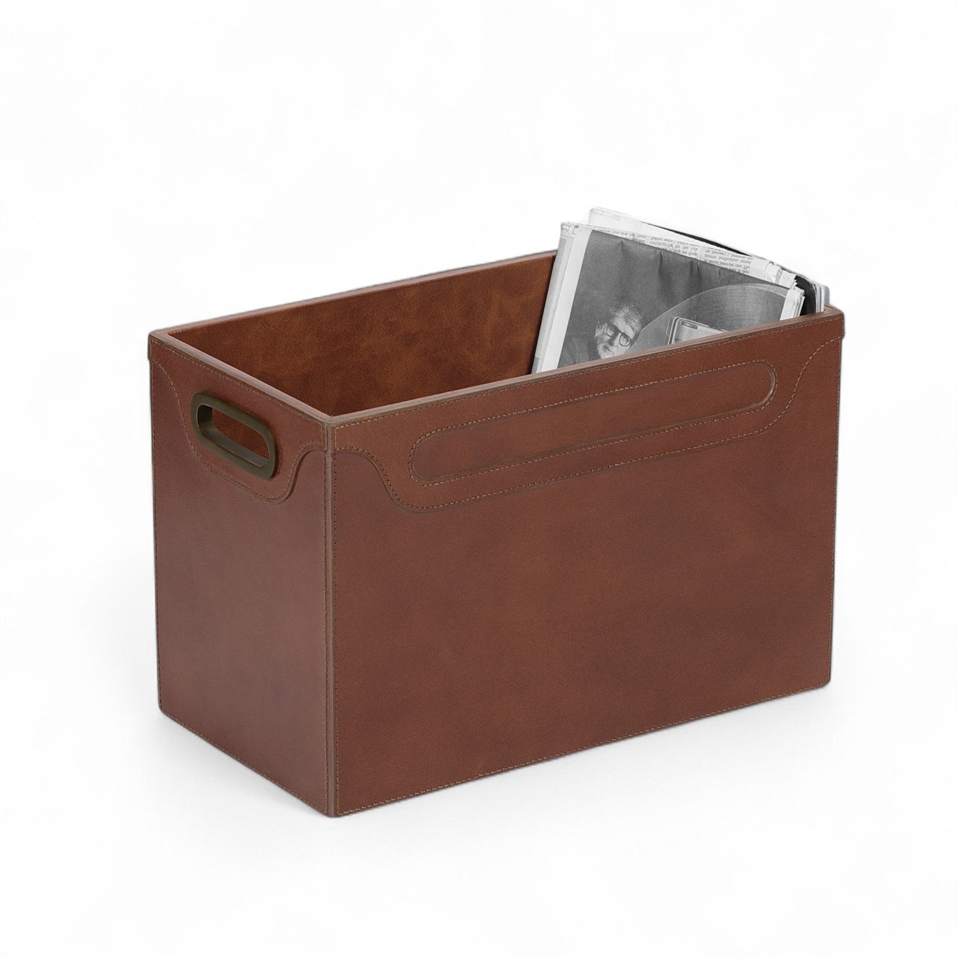 Brown storage bin with a metallic object on a white background