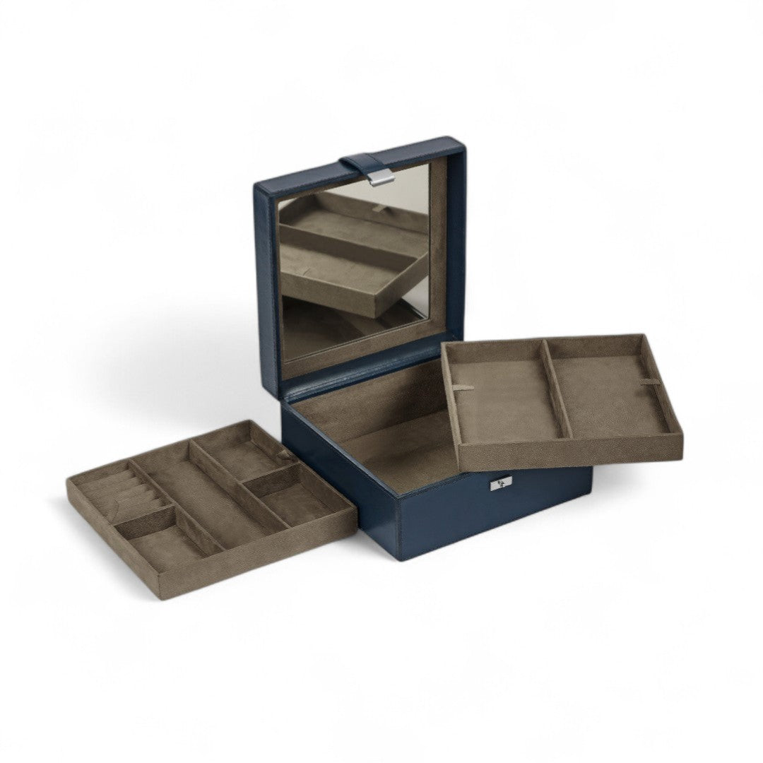 Blue jewelry box with open lid on a white background