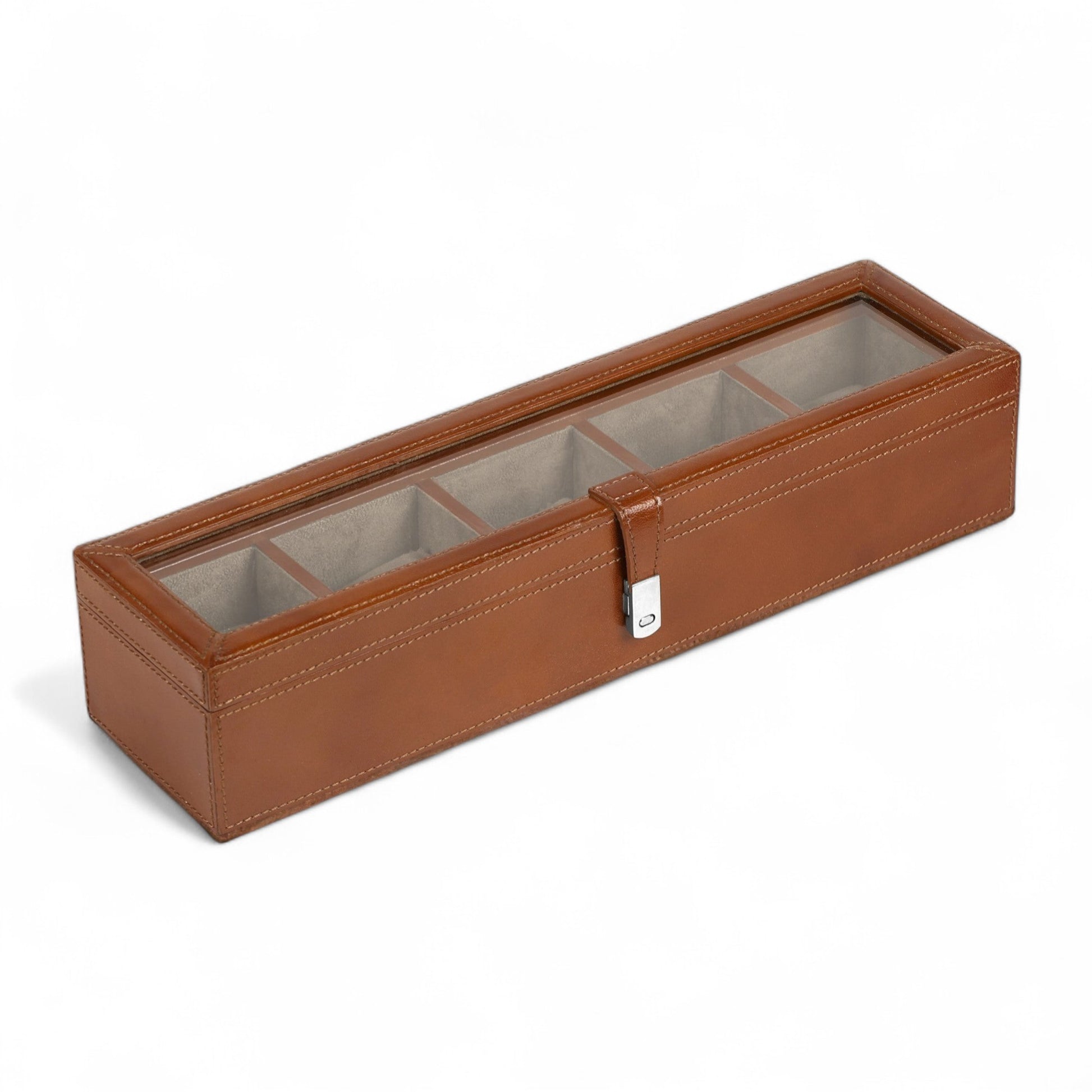 Brown leather jewelry box with glass top on a white background