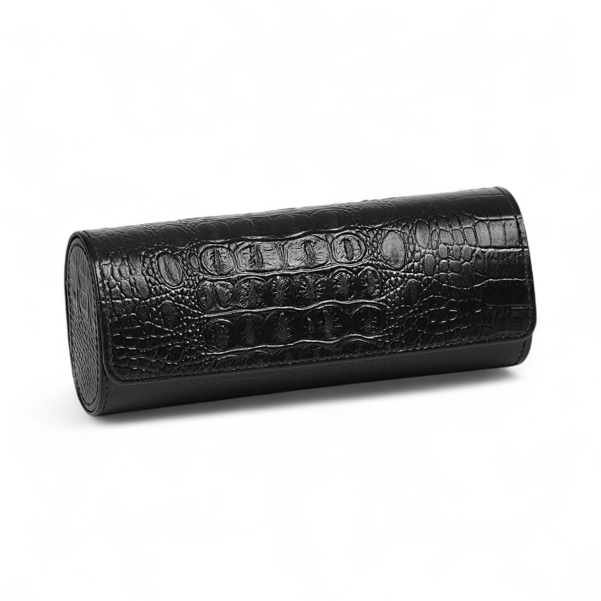 Black textured cylindrical object on a white background