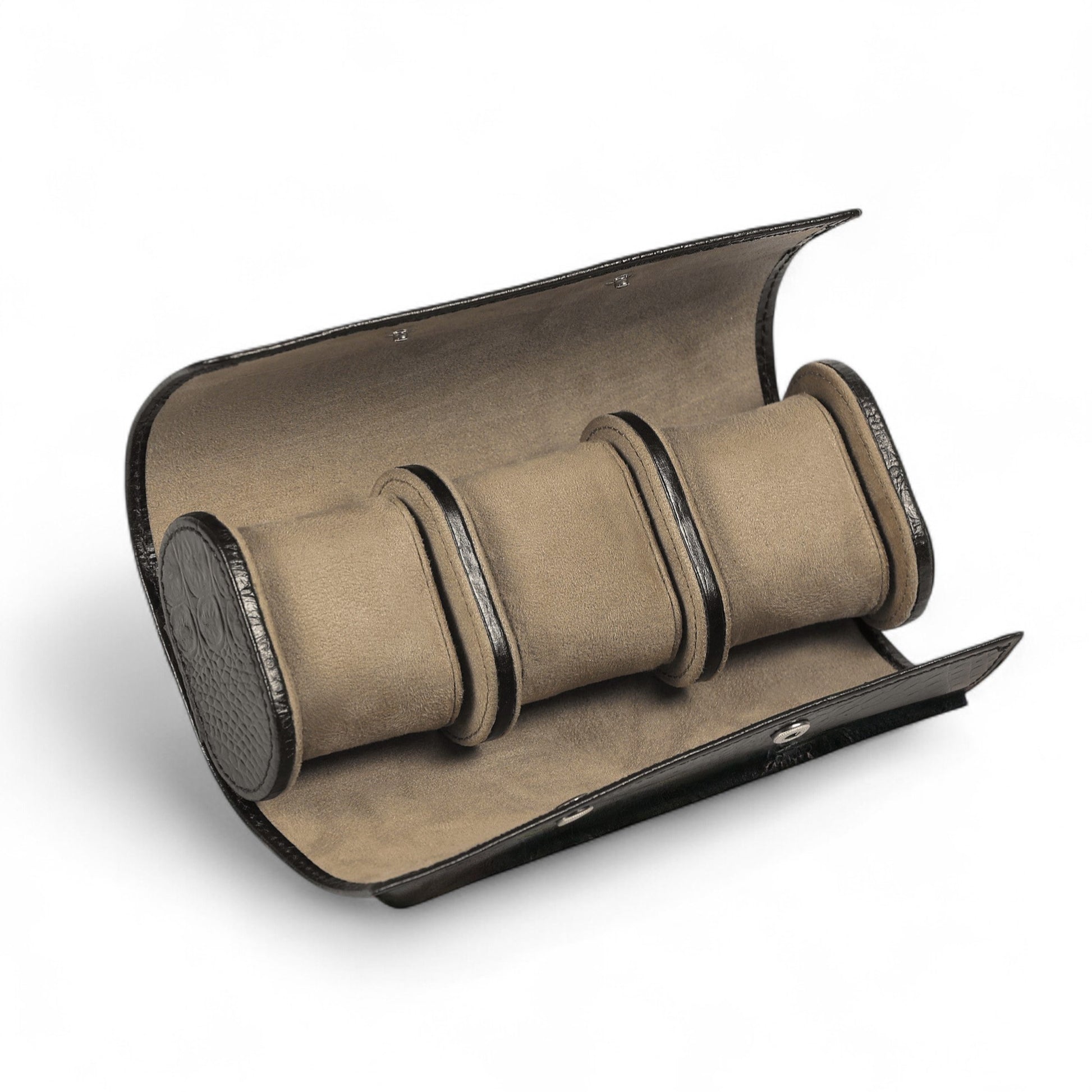 Brown watch roll with three compartments on a white background