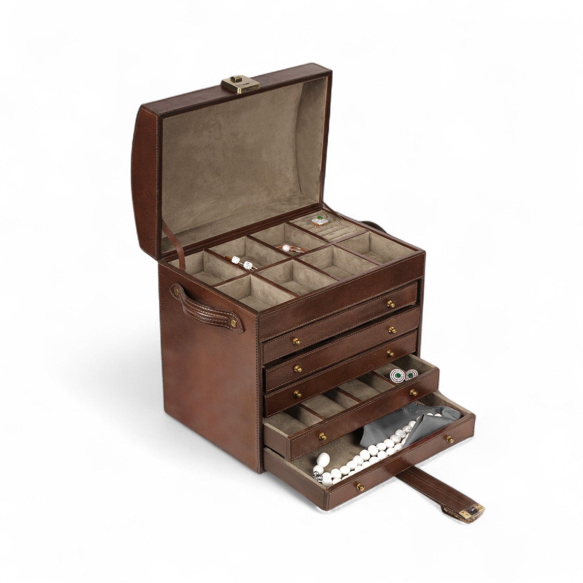 Brown jewelry box with multiple compartments on a white background