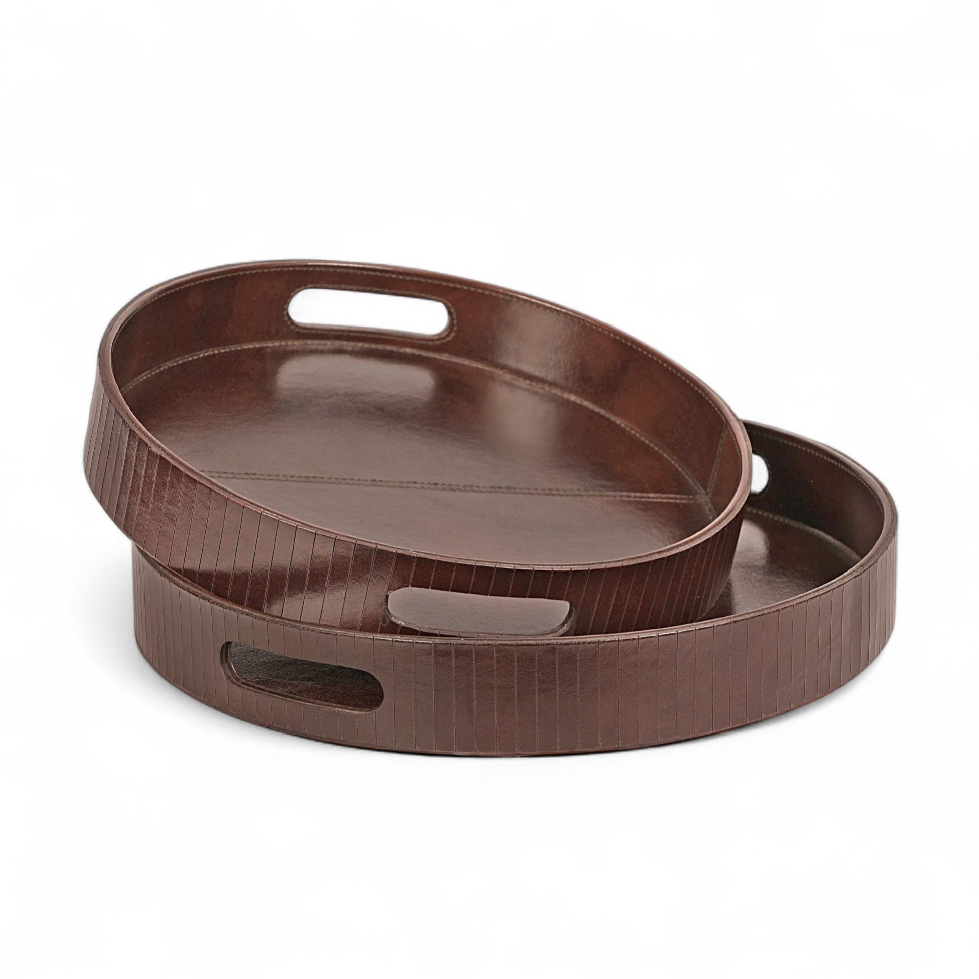 Two brown wooden trays with handles on a white background