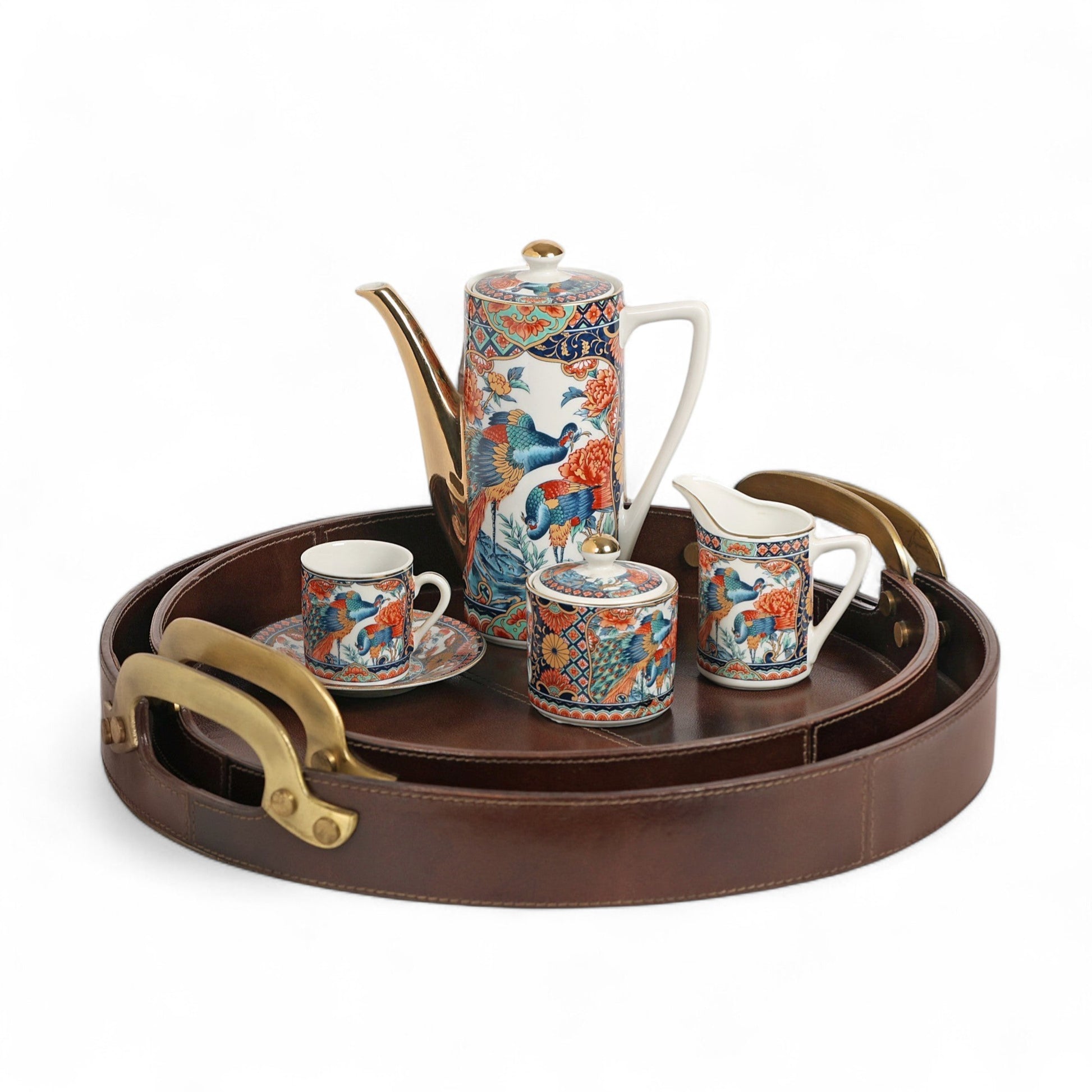 Tea set with floral patterns on a brown tray