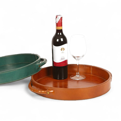 Brown leather tray with a bottle of wine and a glass on a white background