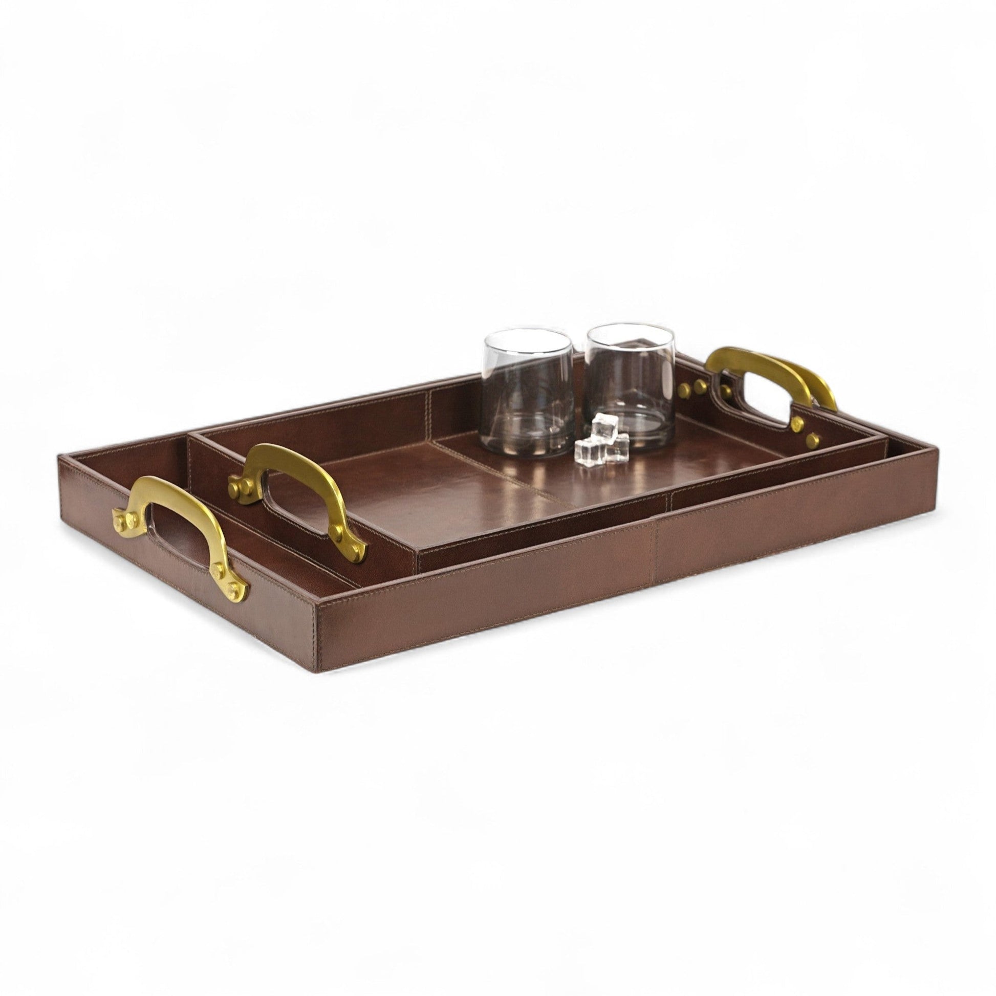 Brown leather tray with gold handles on a white background