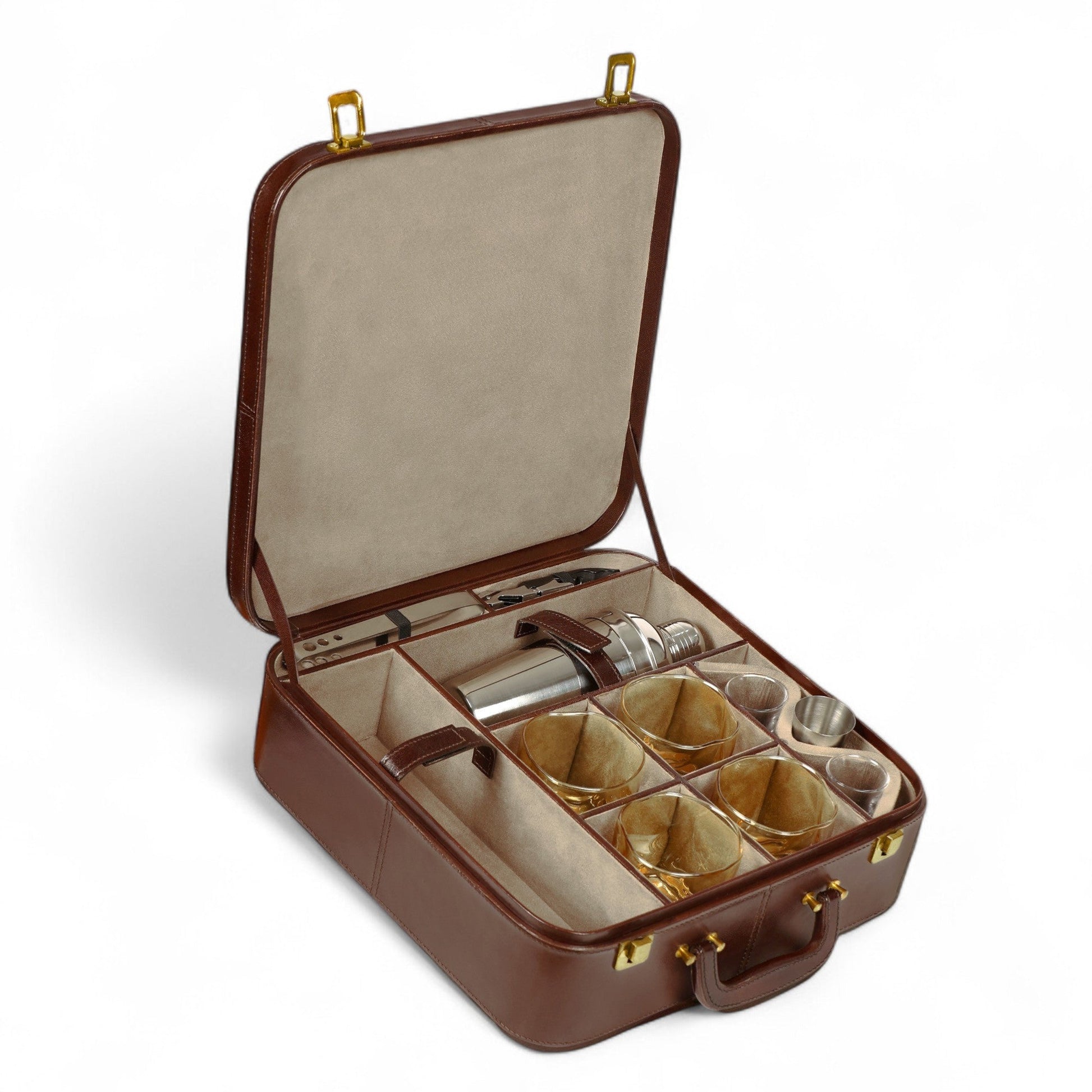 Brown leather case with silver flask and cups on a white background