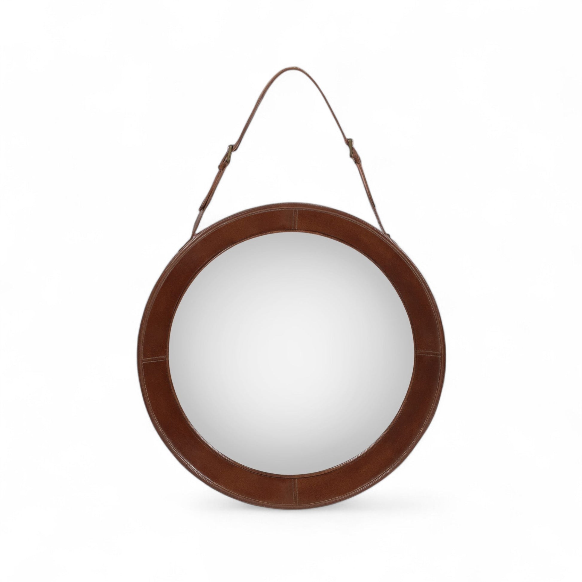 Round mirror with brown frame and leather strap on a white background