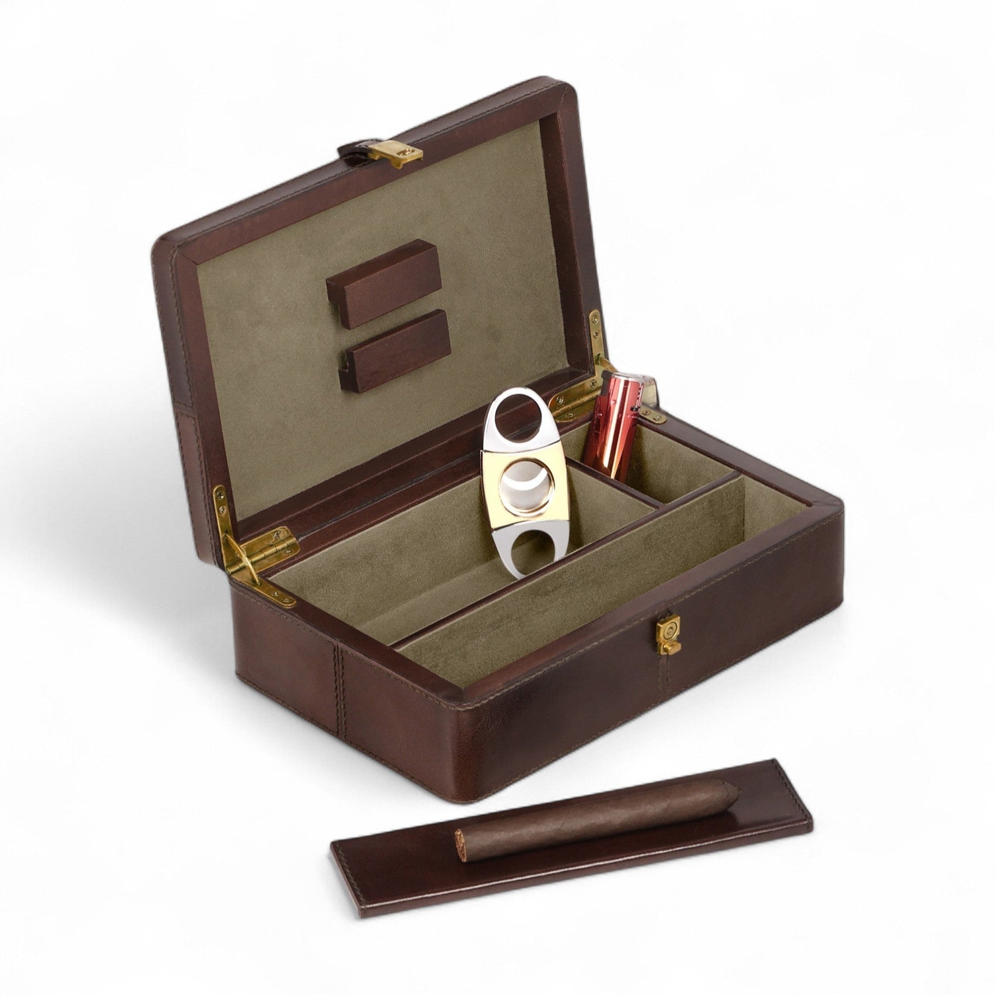 Brown leather cigar case with accessories on a white background