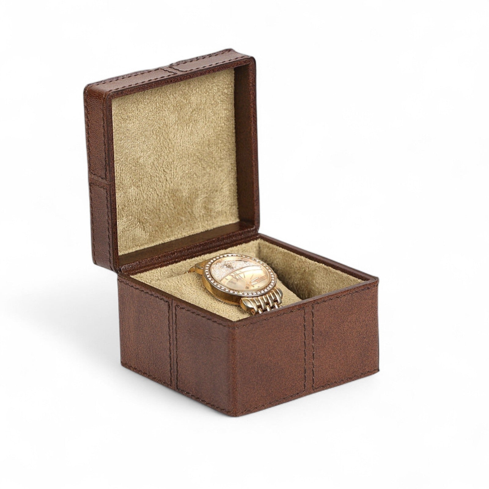 Brown jewelry box with a watch inside on a white background